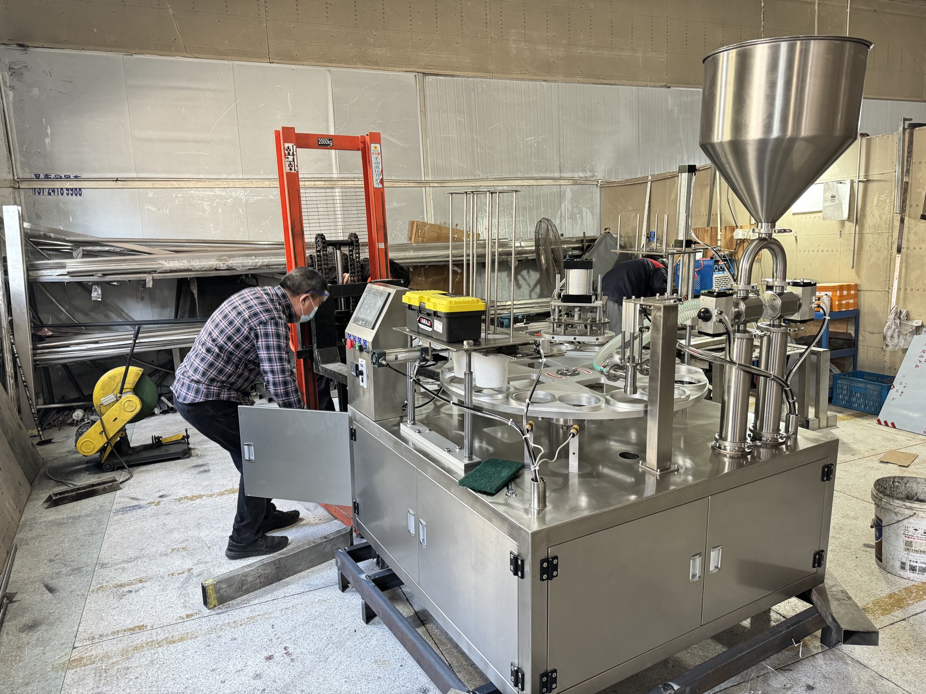 Filling and sealing machine under production at Langtai